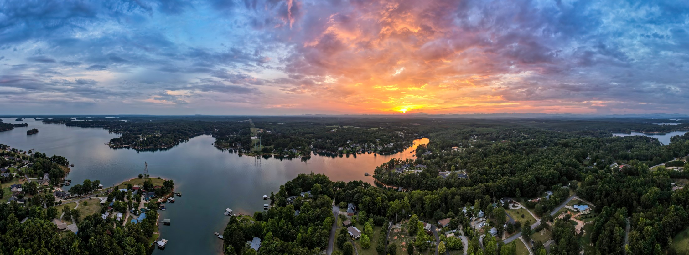 custom Homebuilder in Greenvillehomebuilder lake keowee - aerial shot of lake keowee and neighborhoods